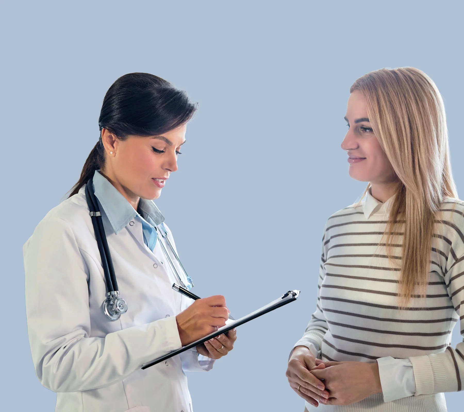 Doctor consulting patient with clipboard at Yatton Pharmacy in Yatton, Bristol