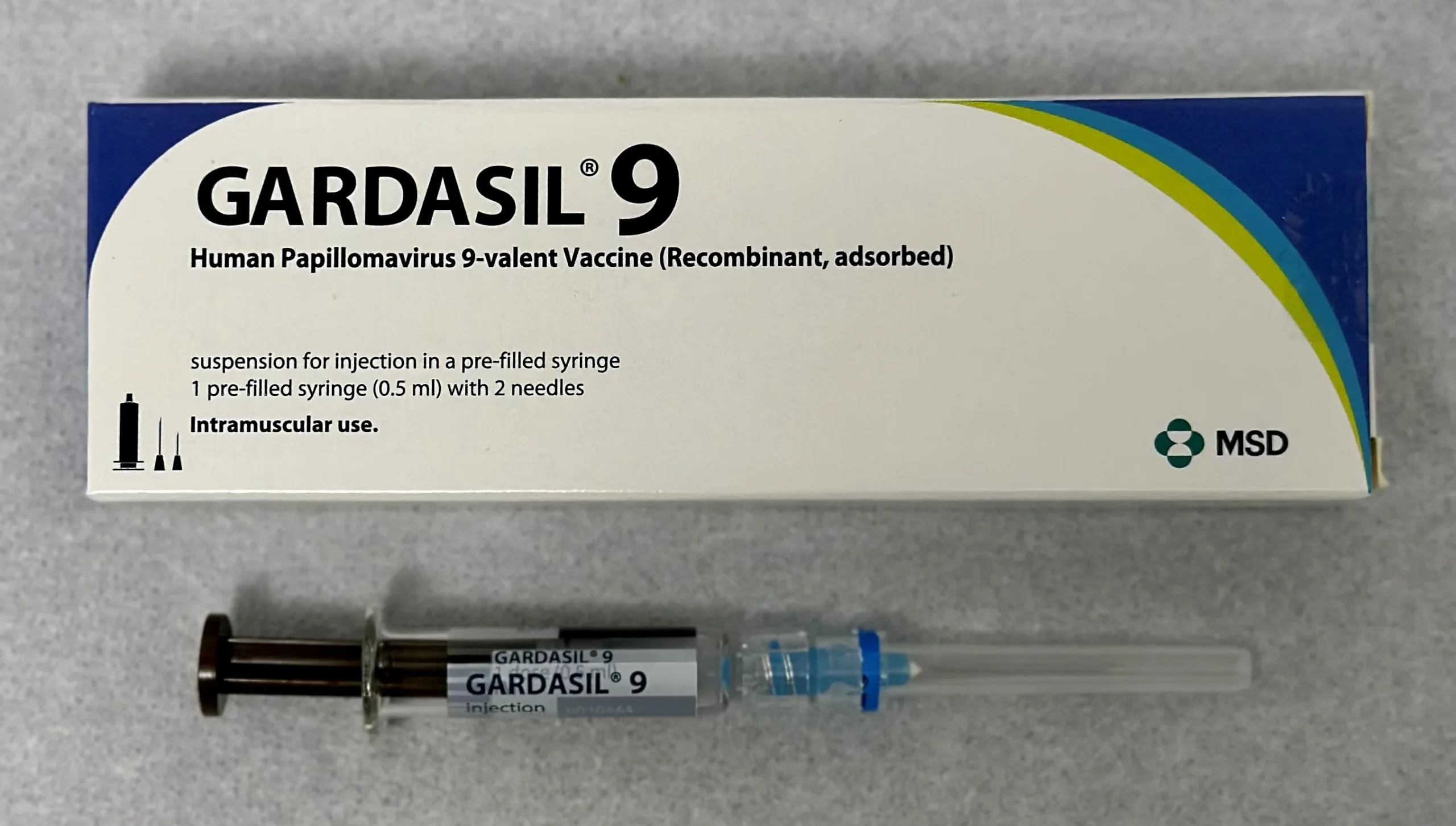 Gardasil 9 HPV vaccine box and pre-filled syringe at Yatton Pharmacy in Yatton, Bristol