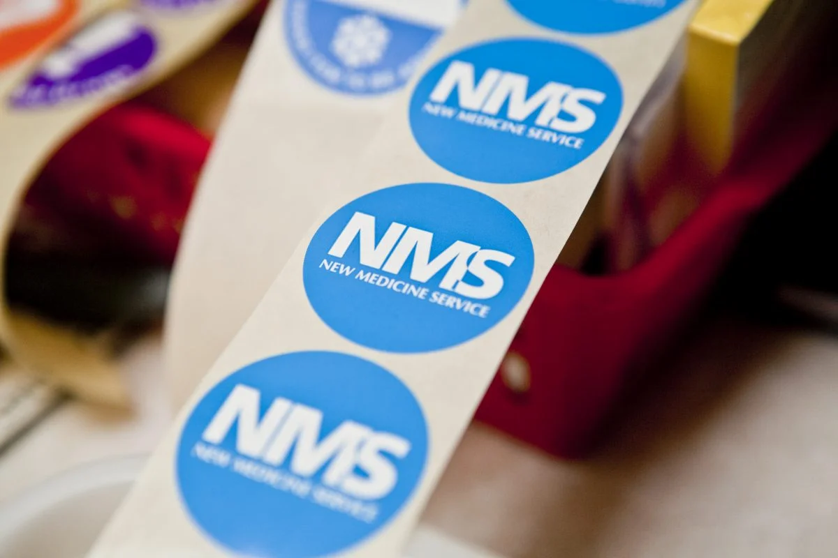 Roll of NMS New Medicine Service stickers at Yatton Pharmacy in Yatton, Bristol