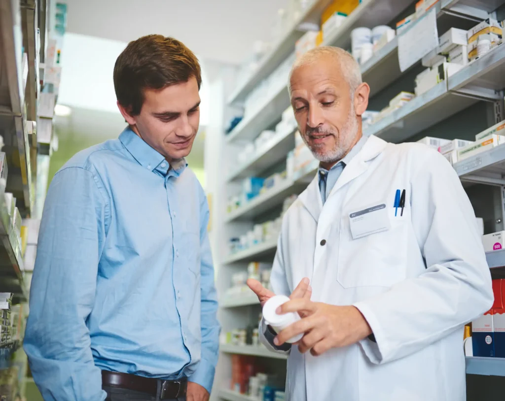 Pharmacist consulting a patient