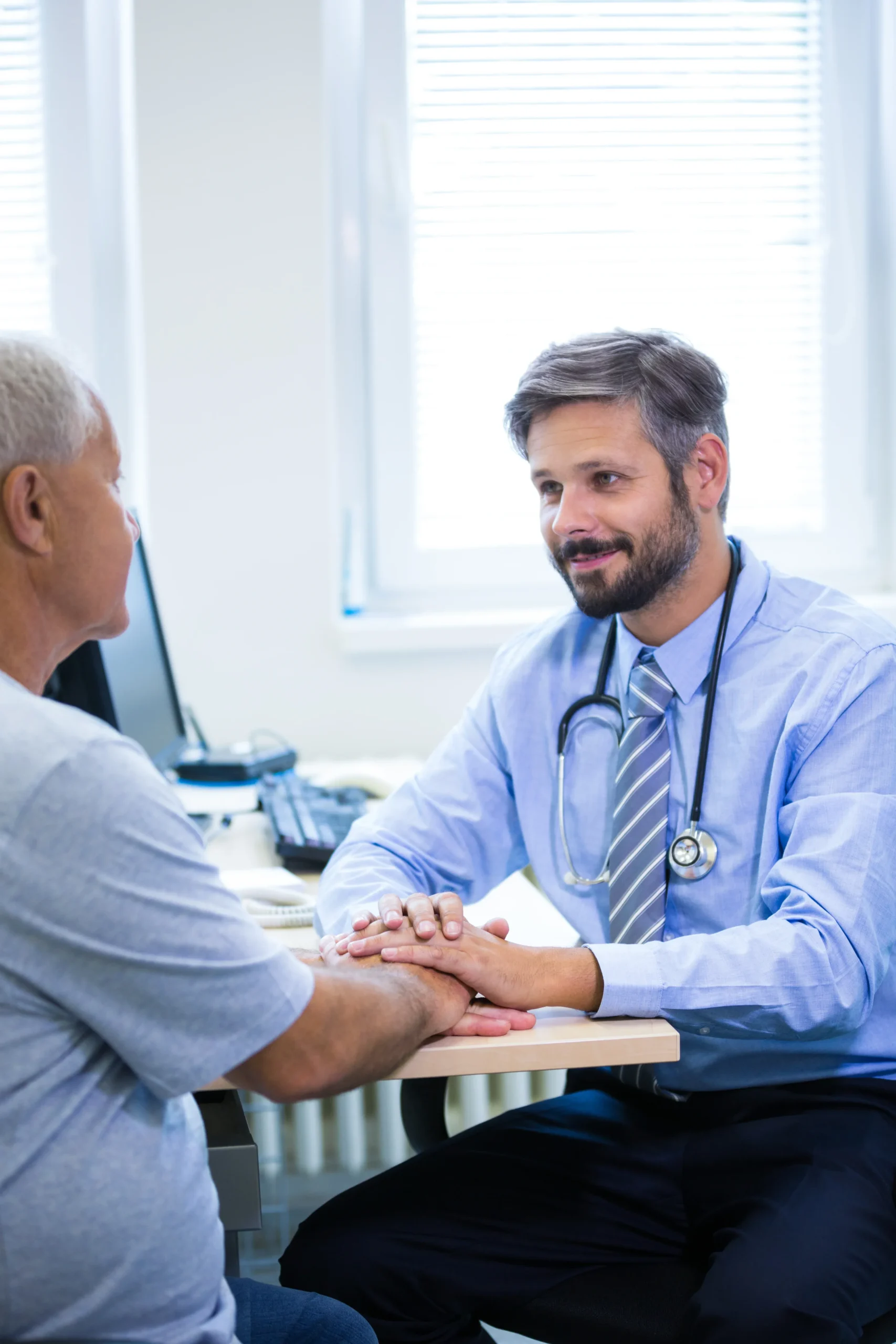 male doctor examining patient